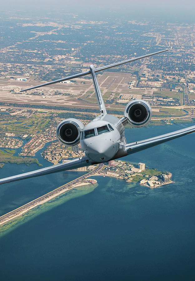 Gulfstream V over Tampa International Airport Mixed Media by Erik Simonsen