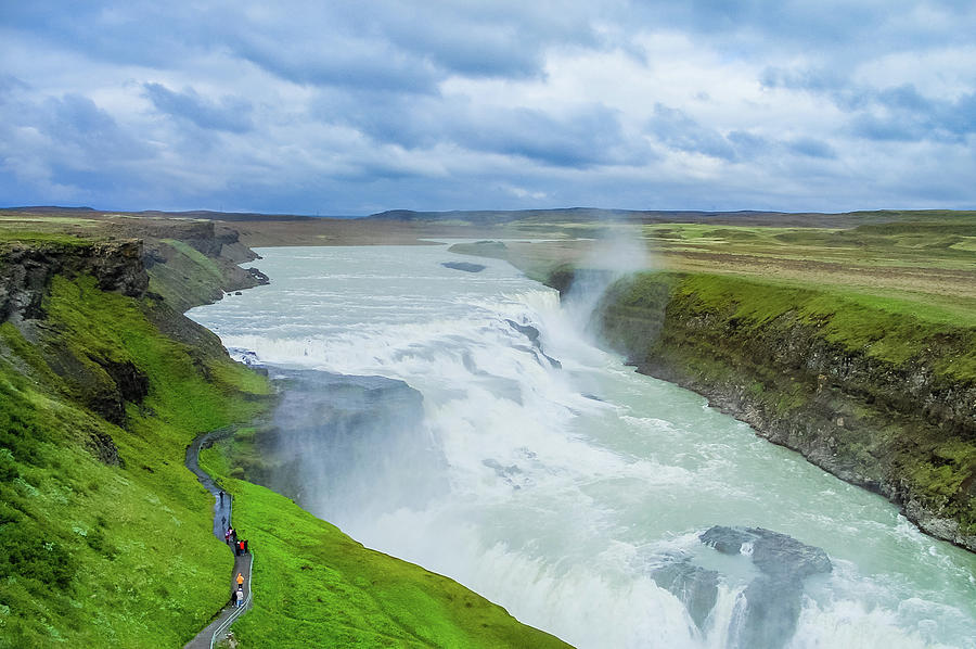 Gullfoss, Golden Falls in Icelandic, is one of the most popular tourist ...