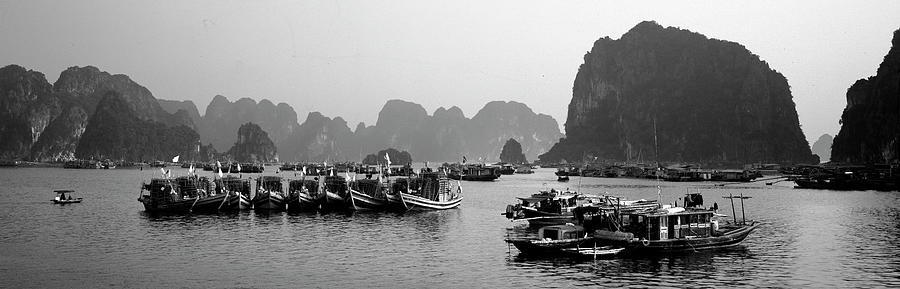 Ha Long Bay fishing boats Vietnam Photograph by Sonny Ryse