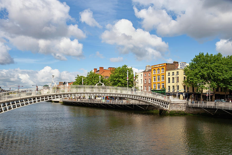 Ha Penny Bridge on River Liffey in Dublin Photograph by Artur Bogacki