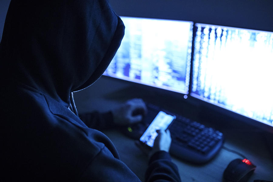 Hacker attacking internet Photograph by Milan_Jovic