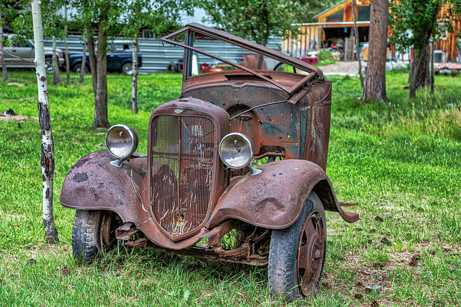 Half A Rusty Chevy Photograph by Lorraine Baum