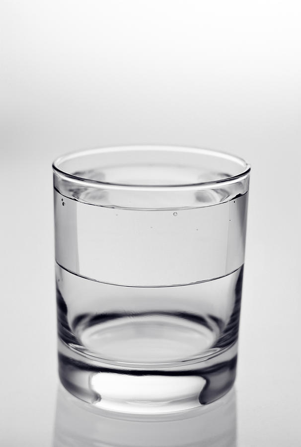 Half-full glass (wrong half), illusion of what it cant be Photograph by Marcoventuriniautieri