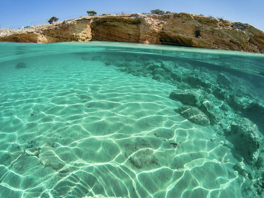 Half underwater view of Koufonissi, Greece Photograph by Constantinos Iliopoulos