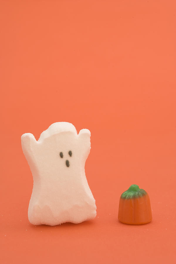 Halloween candy in shape of ghost and pumpkin Photograph by Walter B. McKenzie