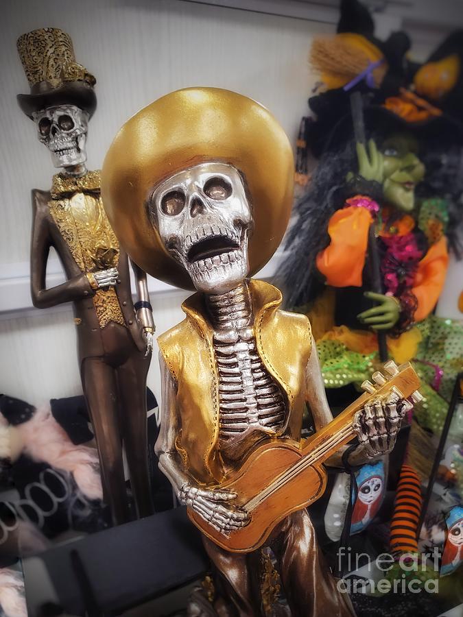 skeleton playing mandolin