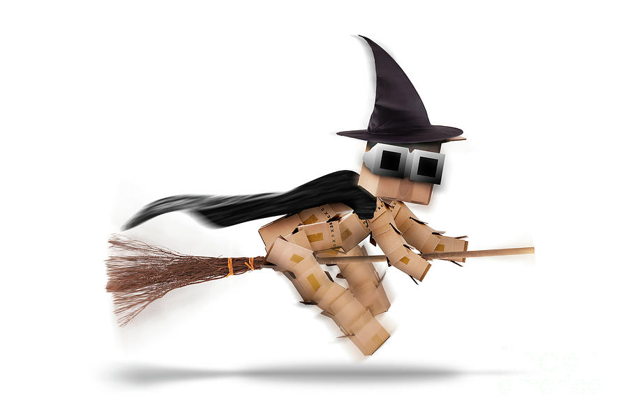 Halloween witch character flying on a broomstick isolated Photograph by Simon Bratt