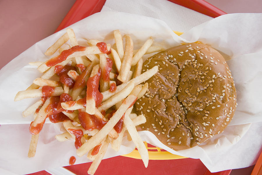 Hamburger and french fries on a fast food tray Photograph by Sian Kennedy