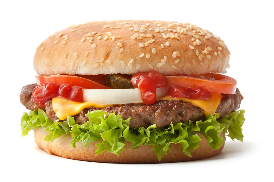 Hamburger on sesame seed bun with fixings Photograph by Floortje