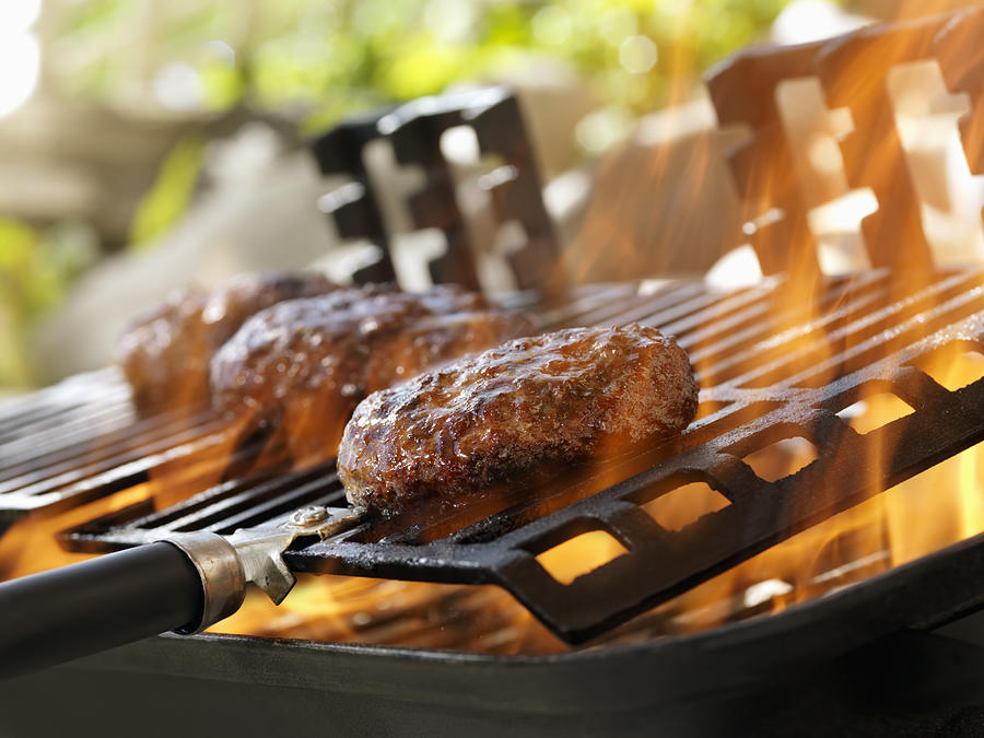 Hamburgers on an Outdoor Grill Photograph by LauriPatterson