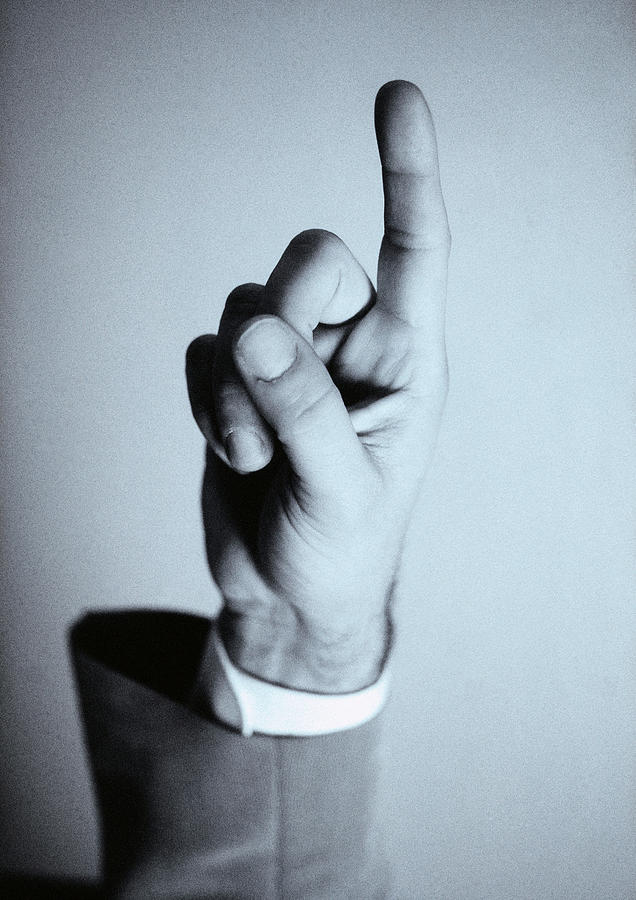 Hand, finger pointing up, b&w. Photograph by Laurent Hamels