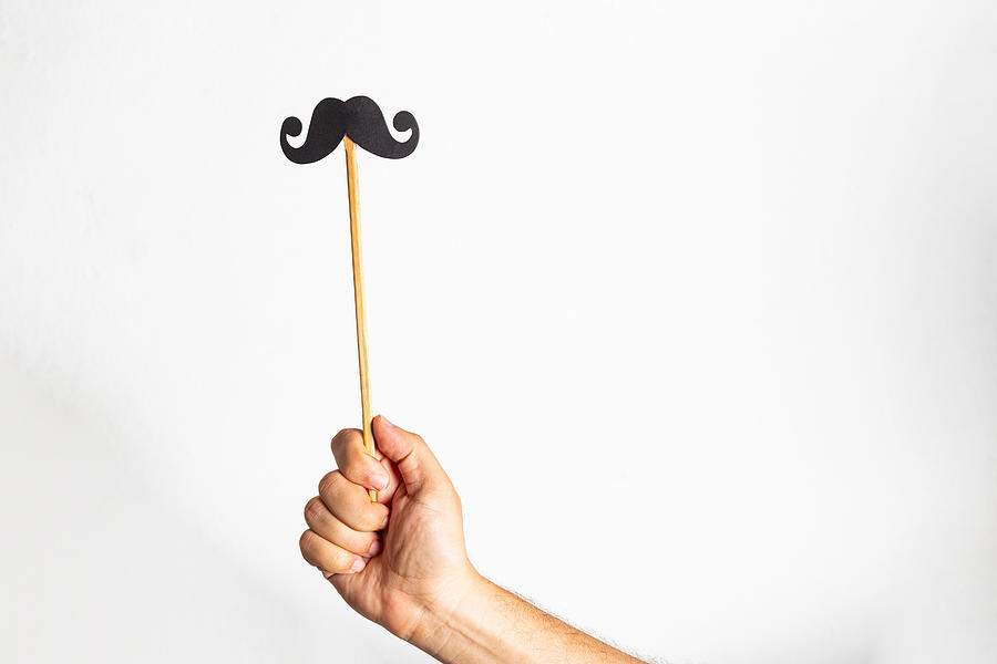 Hand Holding A Mustache Photo Booth Props Photograph by Jaouad k