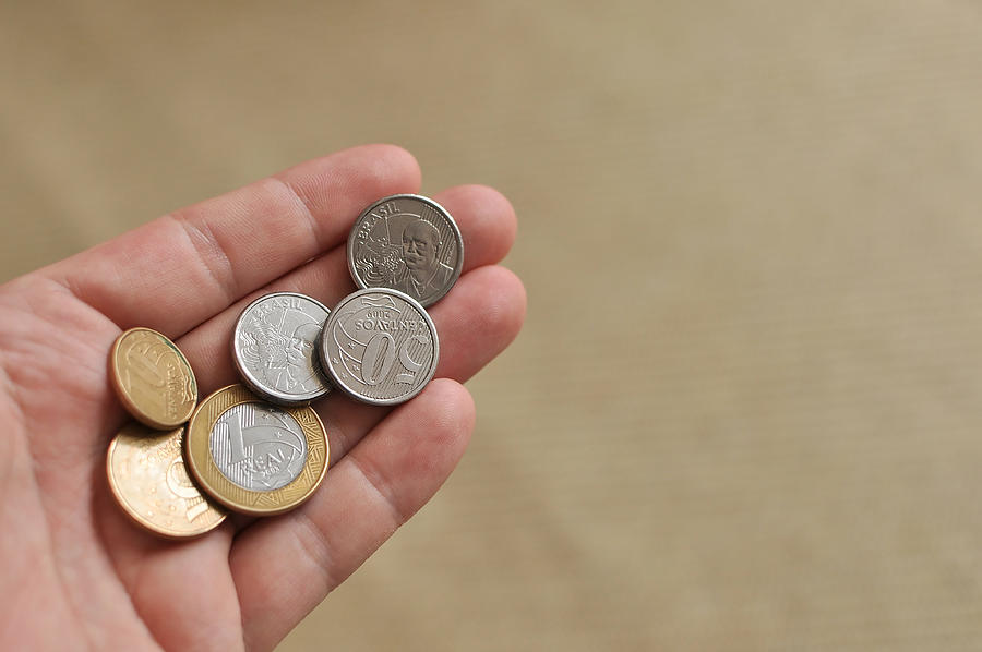Hand Holding Brazil Coins Currency Photograph by Markus Daniel