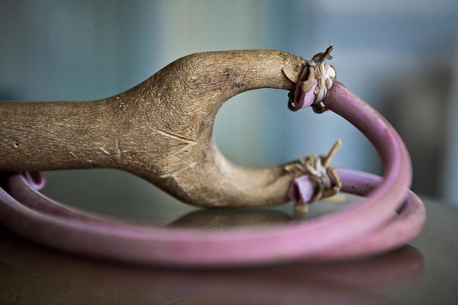 Handmade slingshot from a single wood piece Photograph by Jacobo Zanella