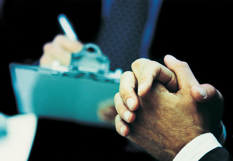 Hands of a Businessman Photograph by Digital Vision.