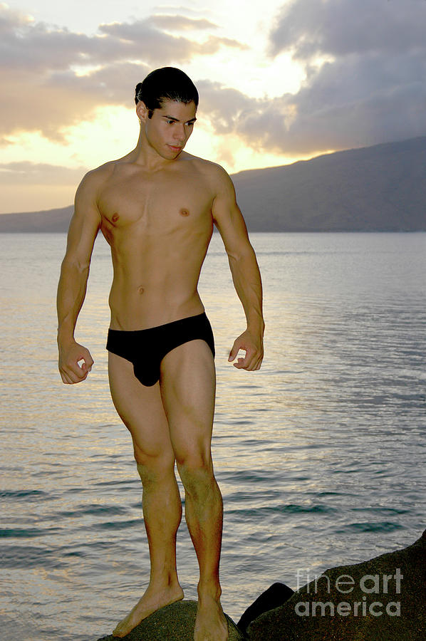 Handsome young man at the beach in Maui, Hawaii Photograph by Gunther Allen