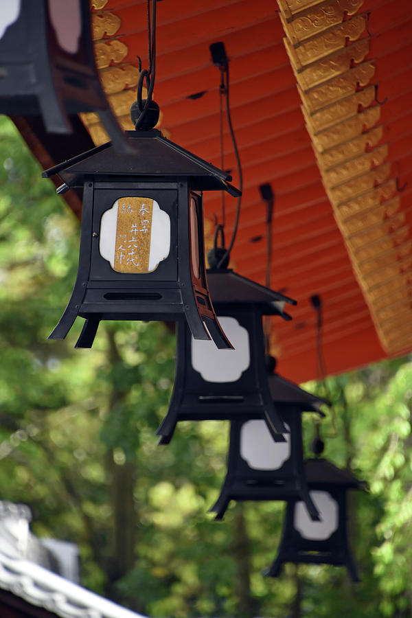 Hanging lanterns at Yasaka Shrine - Kyoto Japan Photograph by Loren Dowding