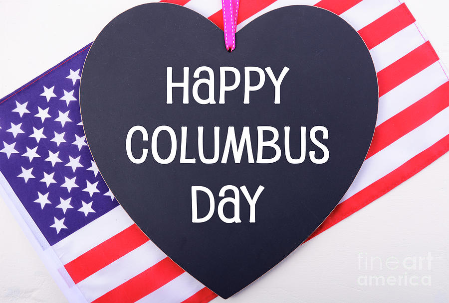 Fourth Of July Photograph - Happy Columbus Day blackboard and flag. by Milleflore Images