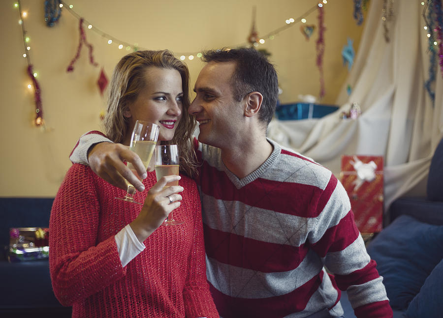 Happy couple in love at Christmas time and New Year. Photograph by Viktor Cvetkovic