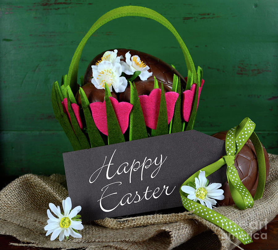 Happy Easter basket of chocolate Easter eggs  Photograph by Milleflore Images
