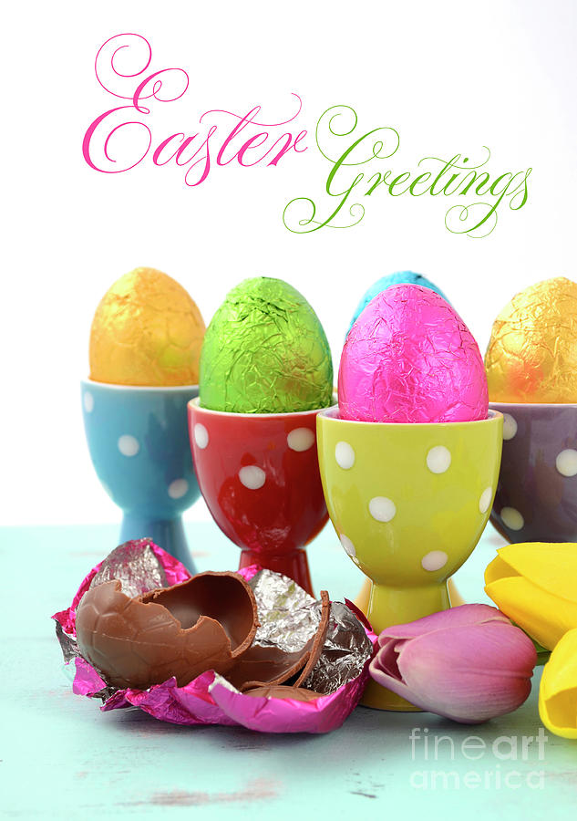 Happy Easter chocolate eggs wrapped in bright color foil  Photograph by Milleflore Images
