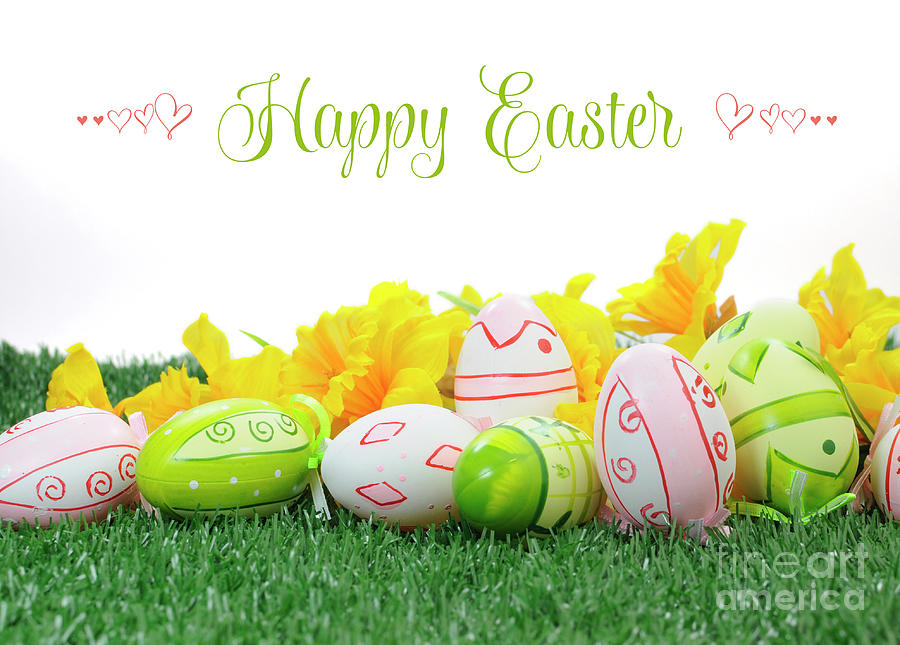 Happy Easter colorful pink and green Easter Eggs with yellow daffodils Photograph by Milleflore Images
