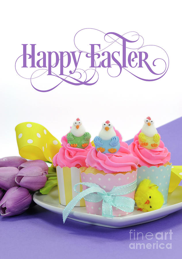 Happy Easter pink, yellow and blue cupcakes with cute chicken decorations and tulips Photograph by Milleflore Images