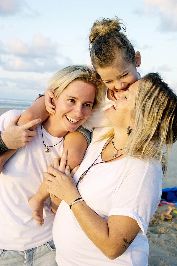 Happy family at the beach Photograph by Frankiefotografie