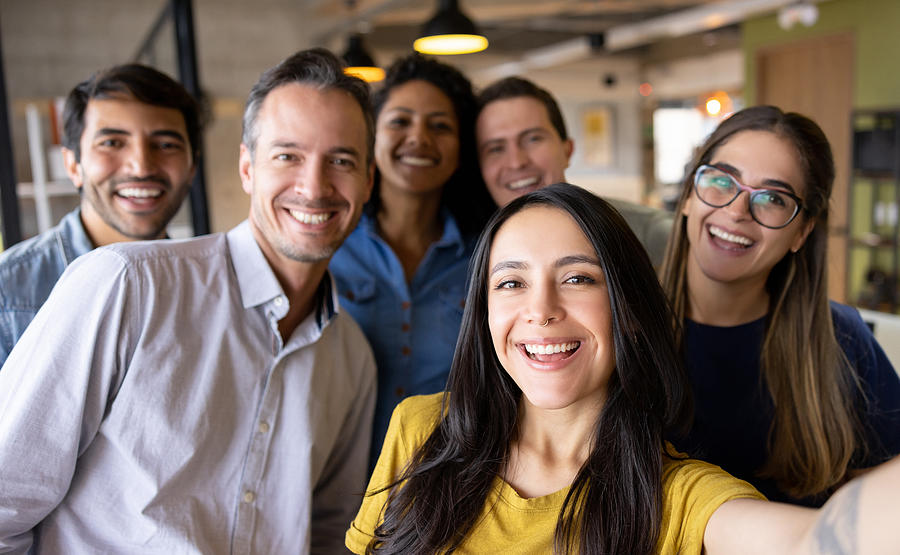 Happy group of coworkers taking a selfie at the office Photograph by Hispanolistic Happy group of coworkers taking a selfie at the office Photograph by Hispanolistic