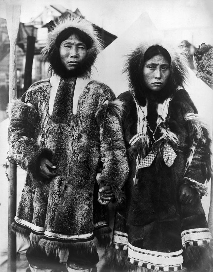 Happy Jack and His Wife - Eskimo Couple In Alaska - Circa 1904 Photograph by War Is Hell Store