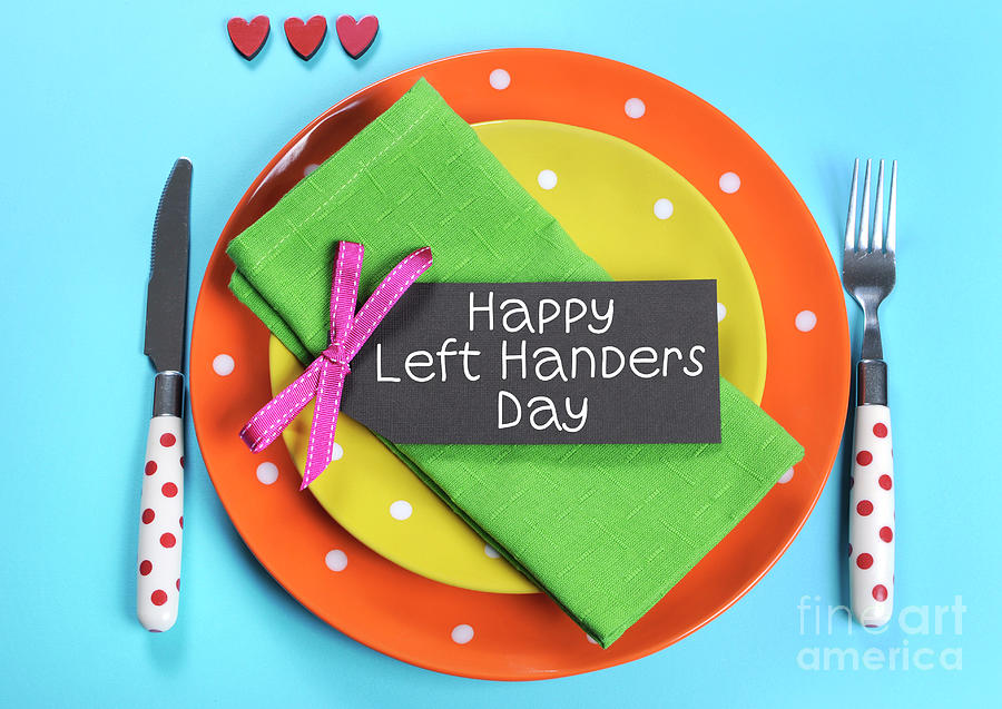 Happy Lefthanders Day, place setting. Photograph by Milleflore Images