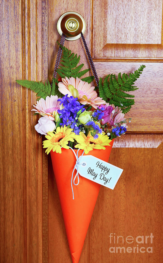 Happy May Day gift of flowers on door.  Photograph by Milleflore Images