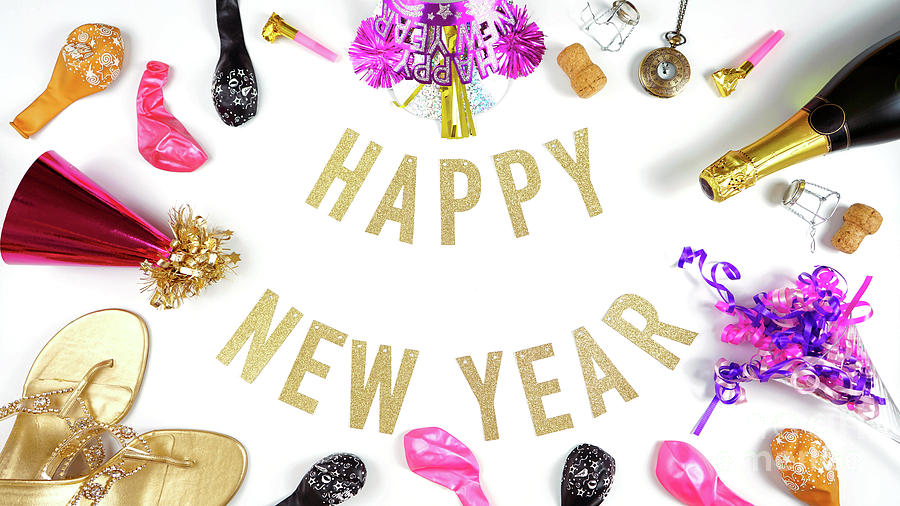 Happy New Years Eve banner with champagne and pink and gold party decorations. Photograph by Milleflore Images