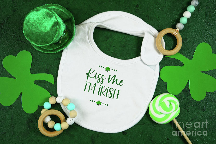 Happy St Patricks Day baby wear white mockup flatlay. Photograph by Milleflore Images