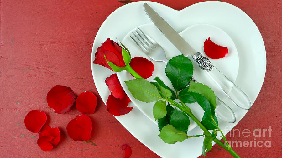Happy Valentines Day place setting with heart shaped plates Photograph by Milleflore Images