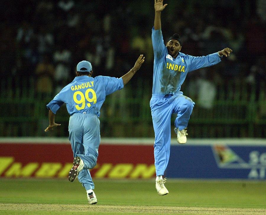 Harbahjan Singh of India celebrates dismissing Jonty Rhodes of South Africa Photograph by Clive Mason