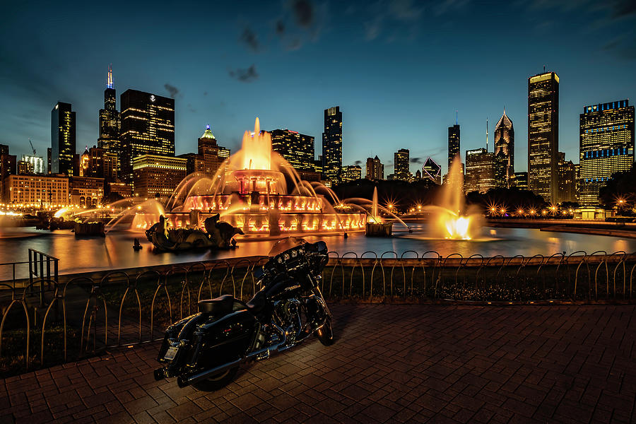 Harley parked by Chicagos Buckingham fountain Photograph by Sven Brogren