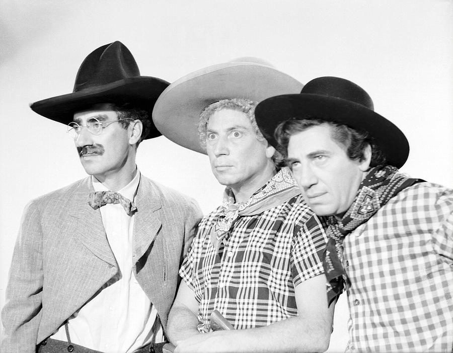 HARPO MARX, THE MARX BROTHERS, CHICO MARX and GROUCHO MARX in GO WEST -1940-. Photograph by Album