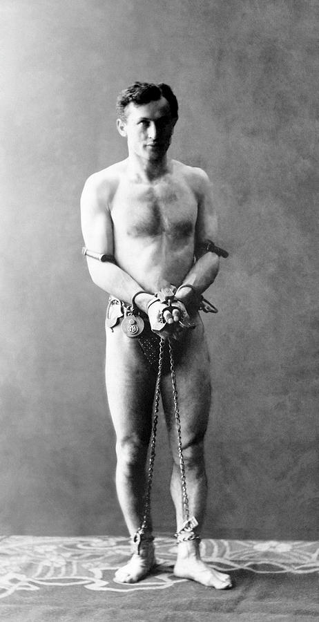 Harry Houdini Shackled In Chains - Circa 1900 Photograph by War Is Hell Store