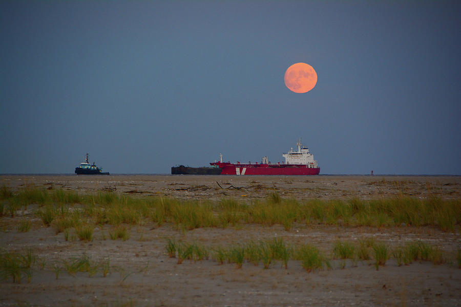 Harvest Moon and Tanker Photograph by Raymond Salani III