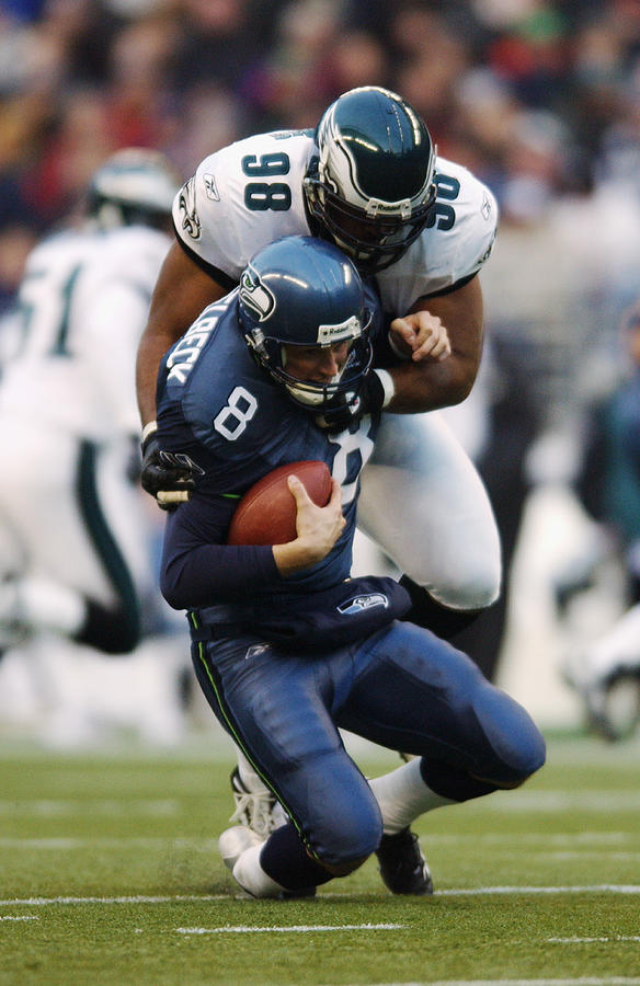 Hasselbeck sacked Photograph by Otto Greule Jr