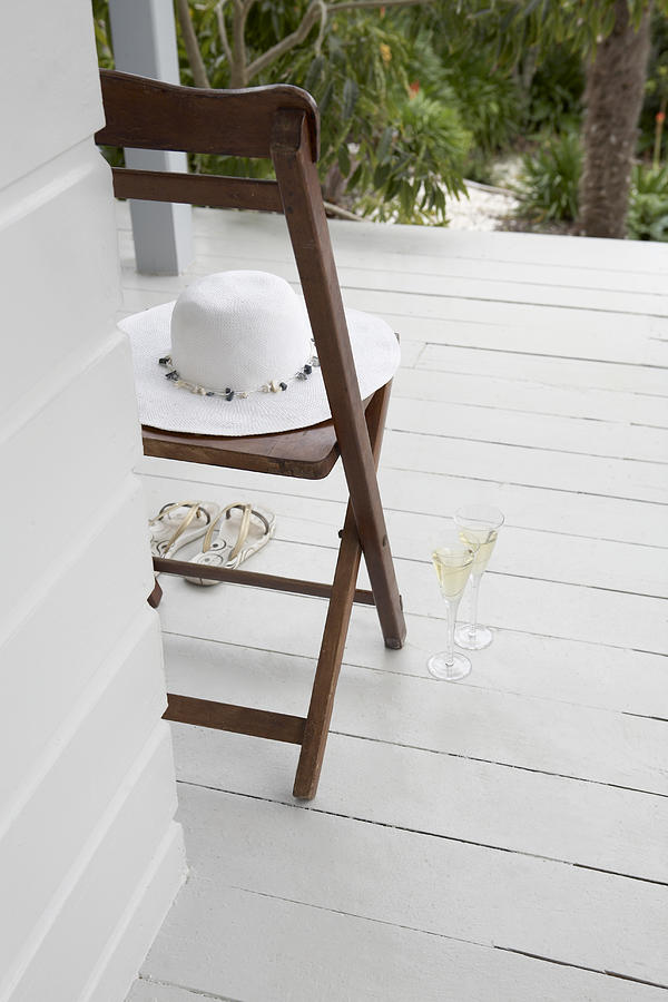 Hat Sandals And 2 Glasses Of Bubbles Photograph by Heidi Coppock-Beard