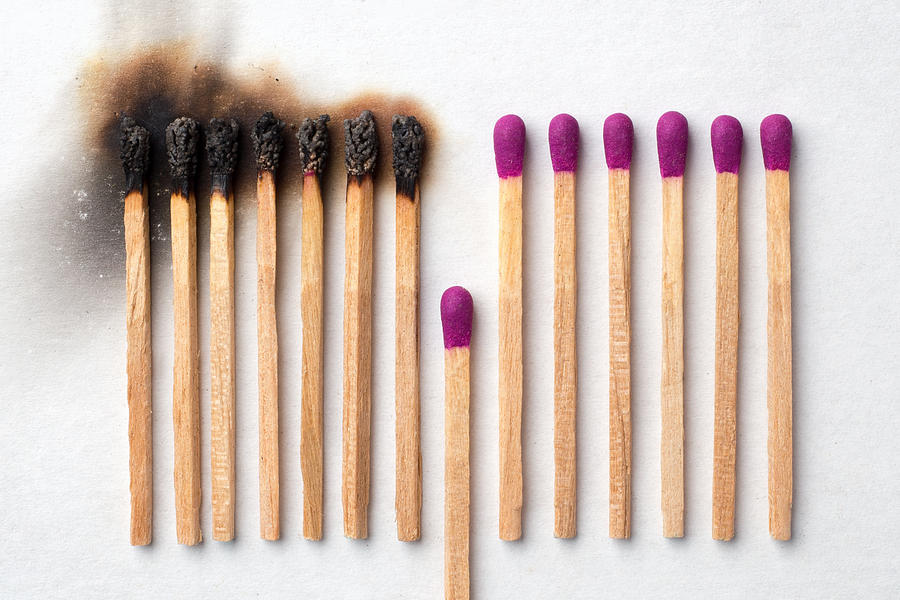 Have a match to give up and avoid other being burned Photograph by Fongfong2