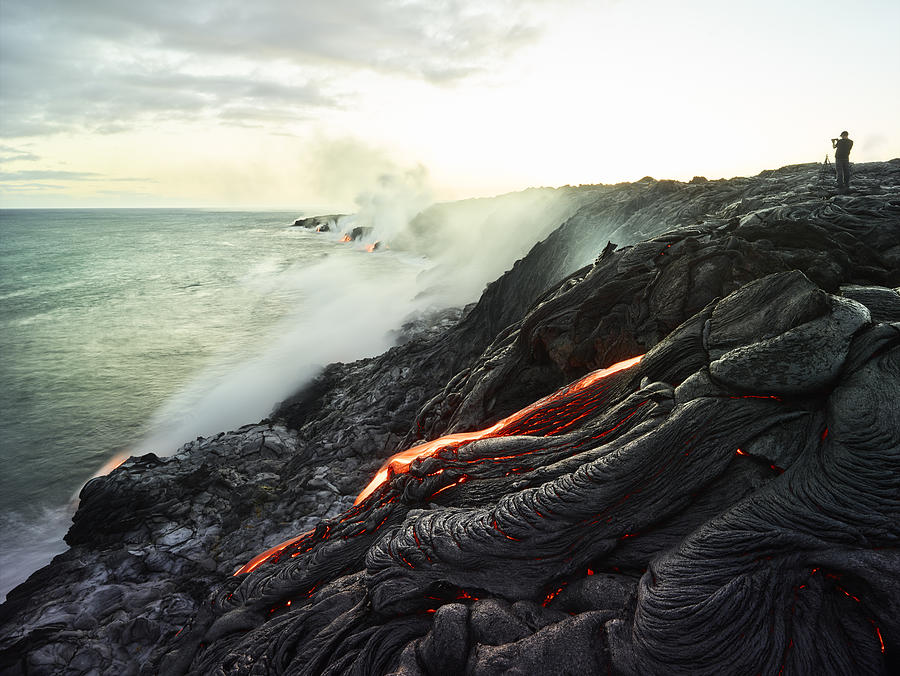 Hawaii, Big Island, Hawaii Volcanoes National Park, lava flowing into pacific ocean, photographer Photograph by Westend61