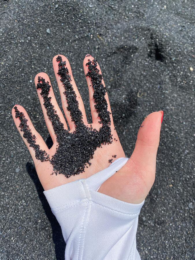 Hawaiian Black Sand On My Hand Photograph by Rachel League