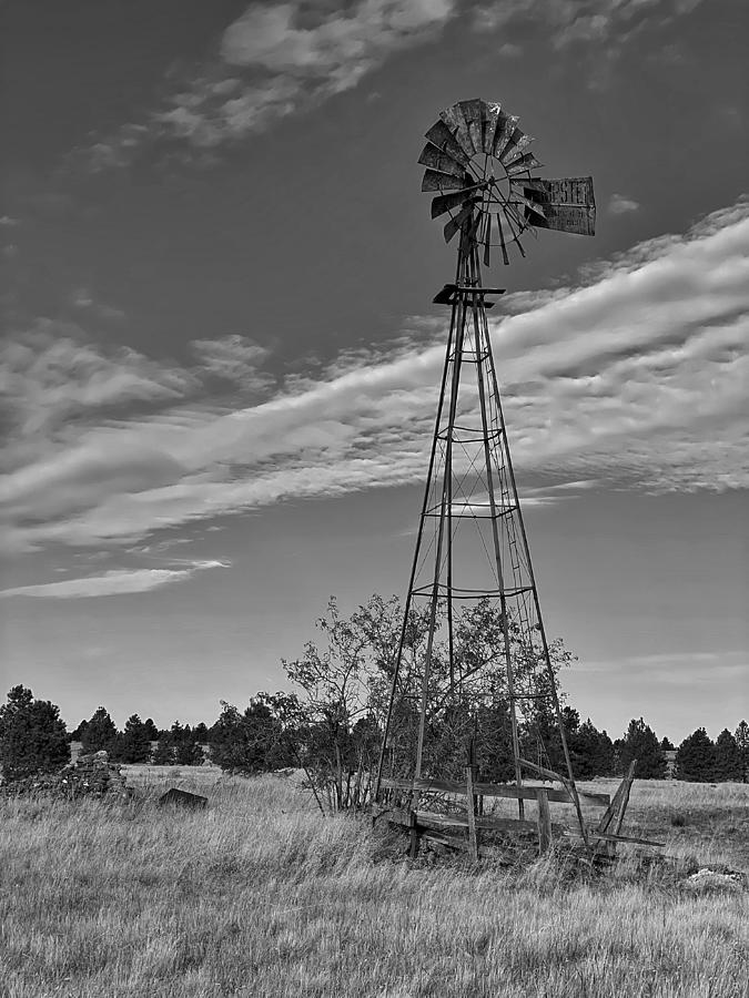 Hawk Creek Rd Windmill bw Photograph by Jerry Abbott