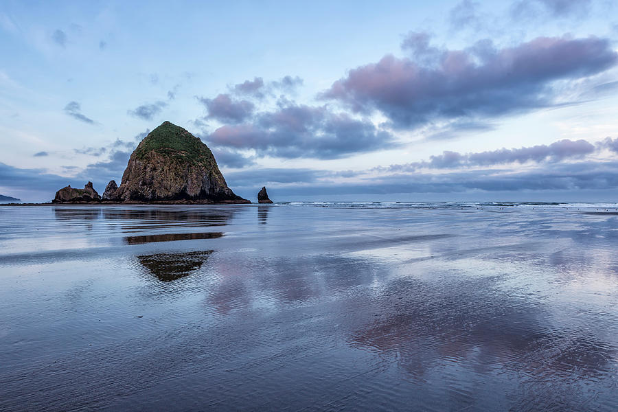 Haystack Rock At Low Tide In Early Morning Photograph