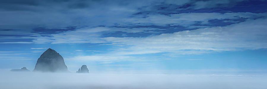 Haystack Rock in the Mist Photograph by Don Schwartz