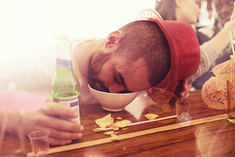 He partied too hard Photograph by Yuri_Arcurs