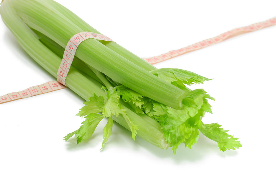 Healthy Celery in measuring tape Photograph by Yumofoto